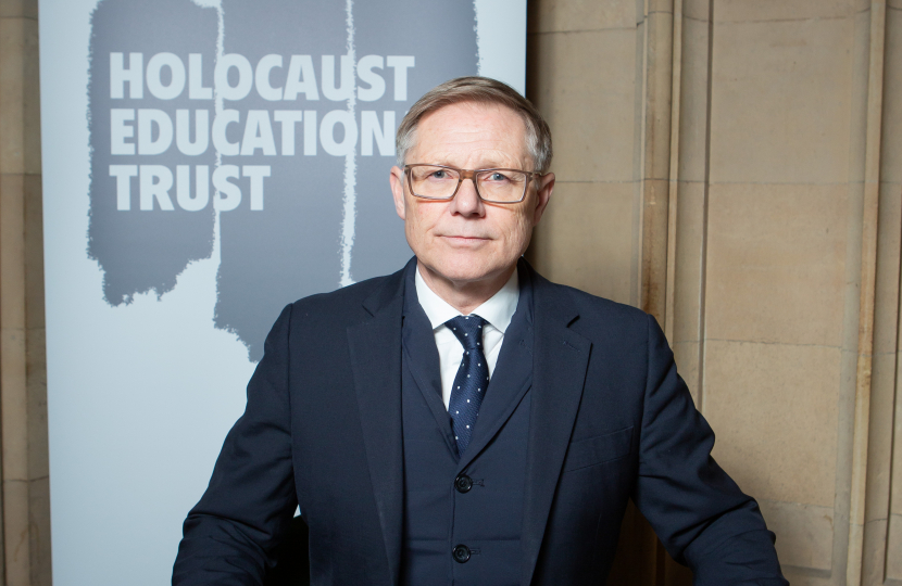 David Morris MP signing the book of commitment 